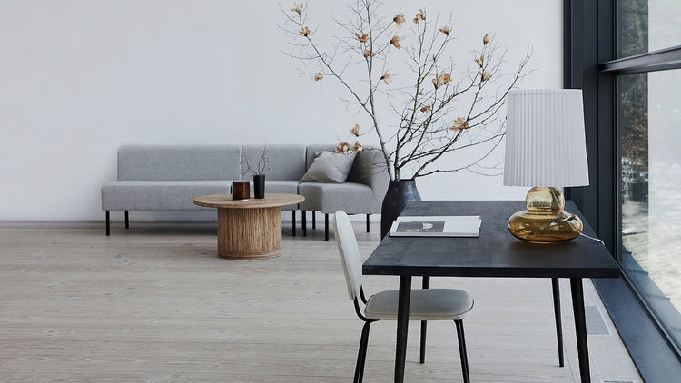 Living room setting with lounge area and home office